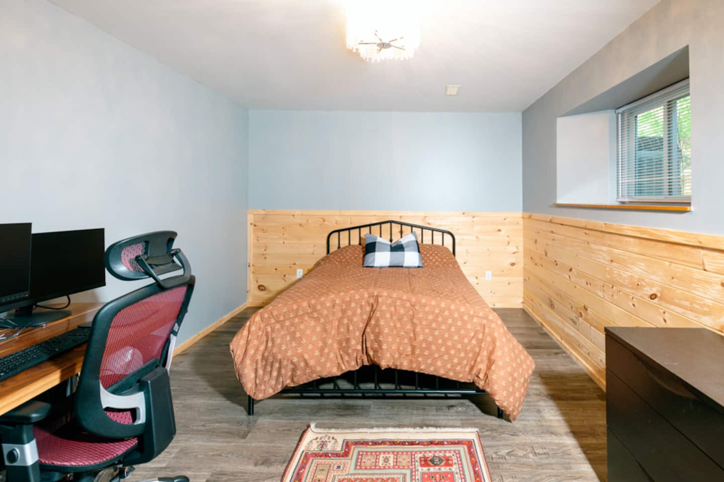 Bedroom with a dedicated desk and office chair